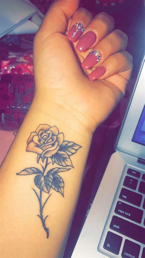 wrist rose tattoo designs|small rose tattoo on wrist.